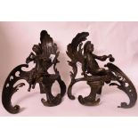 A pair of Louis XVI style bronze chenets