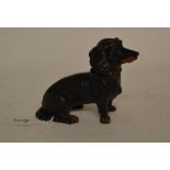 A painted bronze dachshund inkwell, 10.5