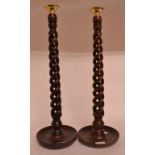 A pair of treen candlesticks, 52.5 cm hi