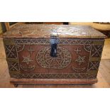 A travelling trunk, with brass stud work decoration,