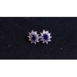 A pair of 9ct gold, sapphire and diamond cluster earrings,