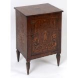 A 19th century Italian walnut cabinet, inlaid a figure, flowers and foliage, having a panelled door,