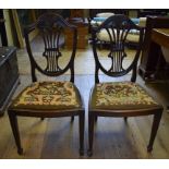 A set of six George III style mahogany shield back dining chairs (4+2) (6)