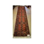 A Persian runner, 86 x 351 cm, and another,
