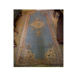 A Turkish Ushak carpet, with central medallion on a blue ground,