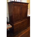 A 19th century inlaid mahogany linen press,