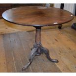 A late 18th/early 19th century padouk wood tripod table, with a birdcage support,