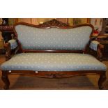 A Danish carved mahogany upholstered three seater settee, on cabriole front legs,