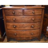 A 19th century mahogany bow front chest, of two short and three graduated long drawers,