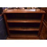 A Victorian mahogany open bookcase, with adjustable shelves, on a plinth base,