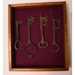 Four iron keys, excavated,