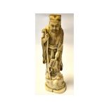 WITHDRAWN: A late 19th/early 20th century Japanese carved ivory figure of a sage, signed, some loss,