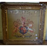 An early Victorian needlework panel, decorated the Royal Coat of Arms,