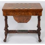 A Victorian burr walnut work/games table, with boxwood stringing,