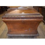 A Victorian oak wine cooler, of sarcophagus form,