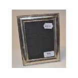 A silver photograph frame,