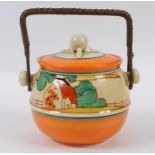 A Clarice Cliff Red Roofs pattern biscuit barrel and cover, shape number 335,