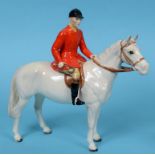 A Beswick Huntsman, painted white, 1501, three legs restored and ears damaged,