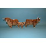 A Beswick Highland Bull, 2008, a Highland Cow, 1740, one horn glued, and a Highland Calf 1827D,