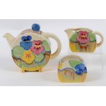 A Clarice Cliff three piece Delecia Pansies pattern Bon Jour tea service,