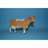 A Beswick Guernsey Cow, 1st version, 1248A, probable restoration to ears and horns,
