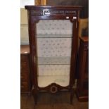 A French style display cabinet, with gilt metal mounts,