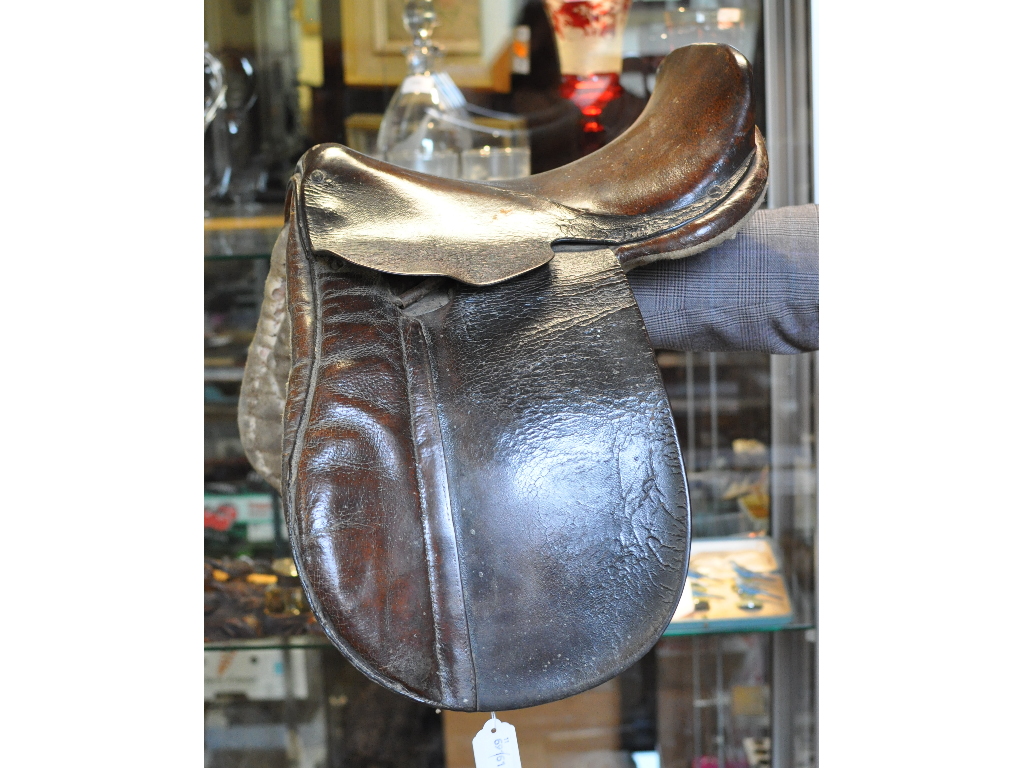 A leather saddle, junior size,