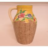 A Clarice Cliff Petunia pattern Lotus jug, with printed Bizarre mark to base,