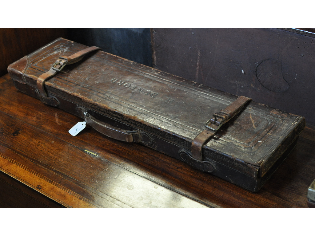 A Victorian leather shotgun case, with a George Daw label,