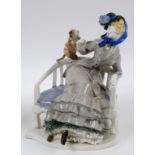 An early 20th century Nymphenburg porcelain group, of a seated lady and a monkey,