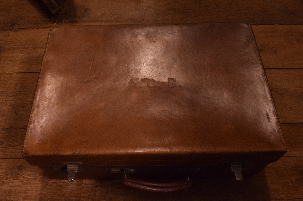 A Drew & Sons leather suitcase, initialled, in its canvas protective case, - Image 2 of 6