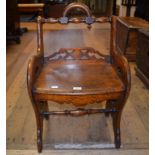 A late Victorian oak window stool/seat, with pierced decoration,