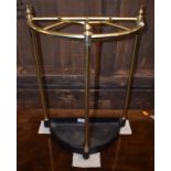 A brass and iron D shape stickstand,