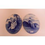 A Doulton Burslem Blue Children Series wall plaque, decorated a girl with a book by the coastline,