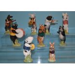 Nine Beswick Pig Promenade Band figures, including John, PP1 and James, PP7,