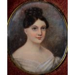 An oval bust portrait miniature, of a lady, watercolour, 5 x 4 cm,