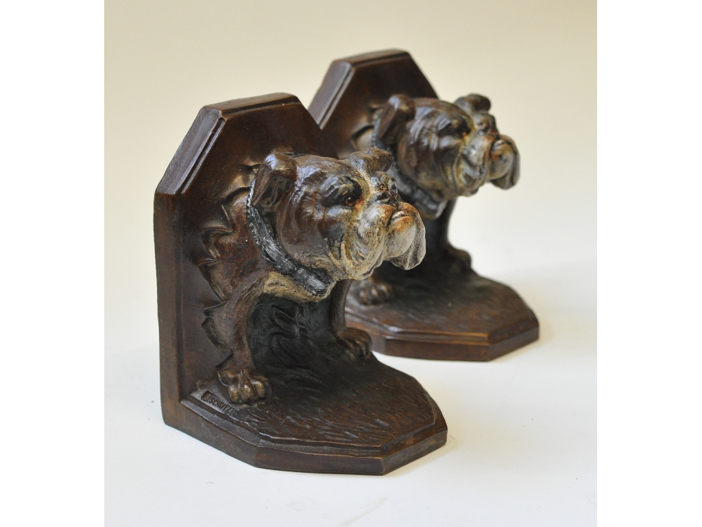 A pair of painted bronze bull dog bookends,