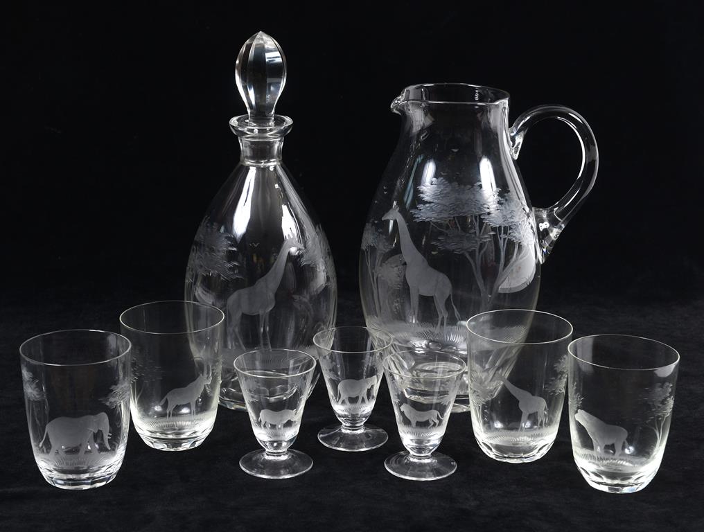 A Rowland Ward glass ewer, etched a giraffe, 24 cm high, a matching decanter and stopper,