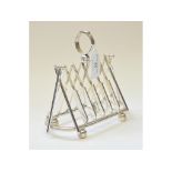 A silver plated cricket toast rack