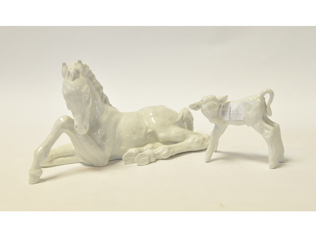A Meissen calf, 8 cm high, and a Meissen lying foal,
