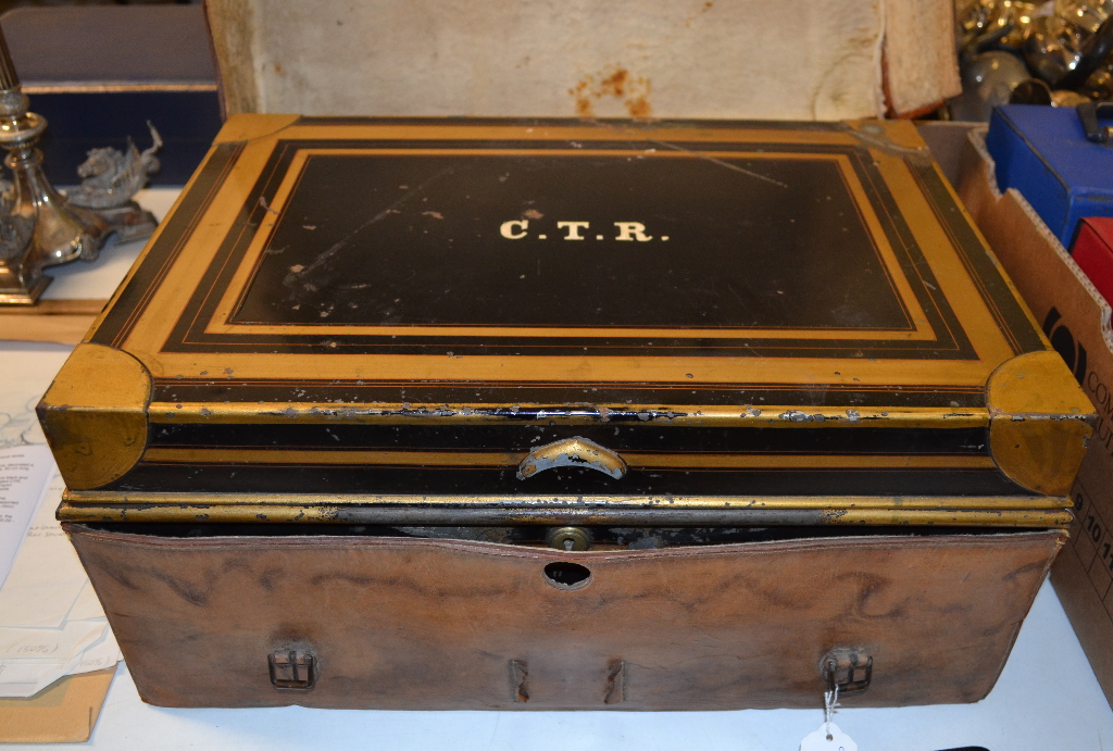 A 19th century Allibhoy Vallijee & Sons black and gold painted metal dispatch box, initialled CTR,