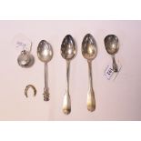 A late Victorian silver sovereign holder, lacks button, a silver caddy spoon,