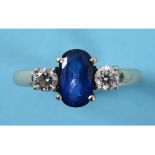 An 18ct white gold, oval sapphire and diamond ring, approx.