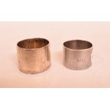 Two silver napkin rings, assorted silver spoons, approx. 10.