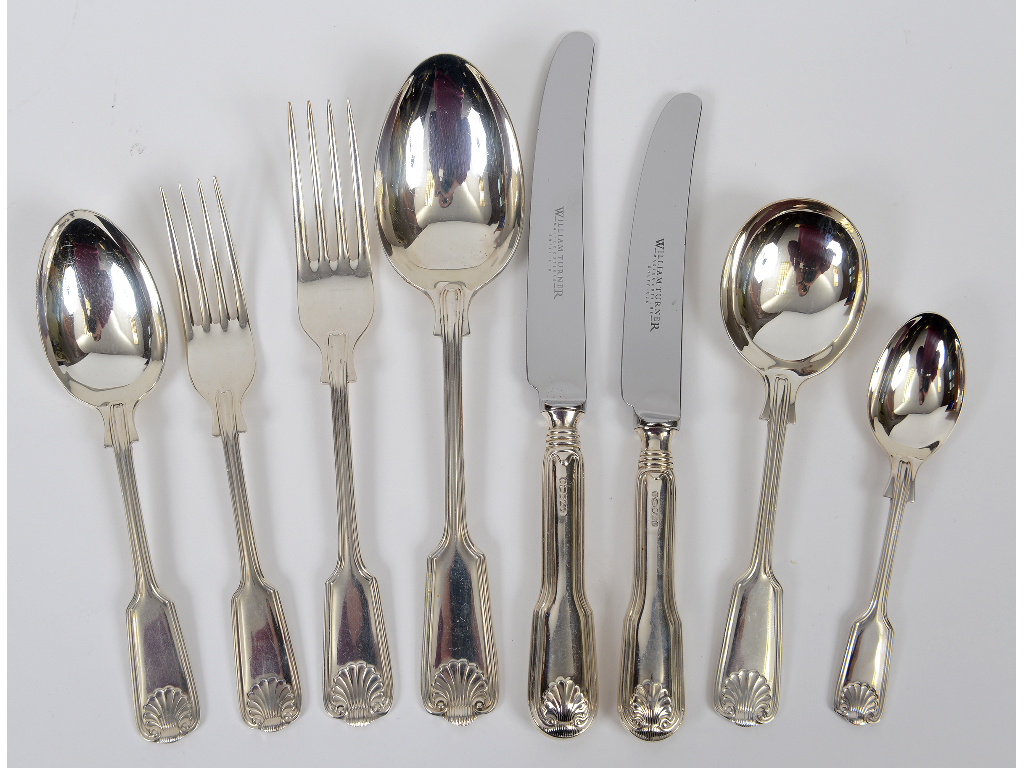 A canteen of silver fiddle, thread and shell pattern cutlery, for six place settings,