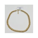 A 9ct gold and textured link necklace, approx. 21.