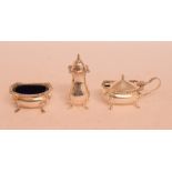 A silver three piece cruet, Birmingham 1931/32, a silver plated Jersey style milk jug, 12 cm high,