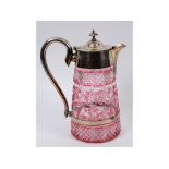 A cut and flashed glass claret jug, decorated acorns and branches, with plated mounts,