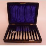 Six silver and mother of pearl fruit eaters, Sheffield 1858, including two later knives,
