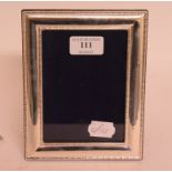 A silver photo frame,